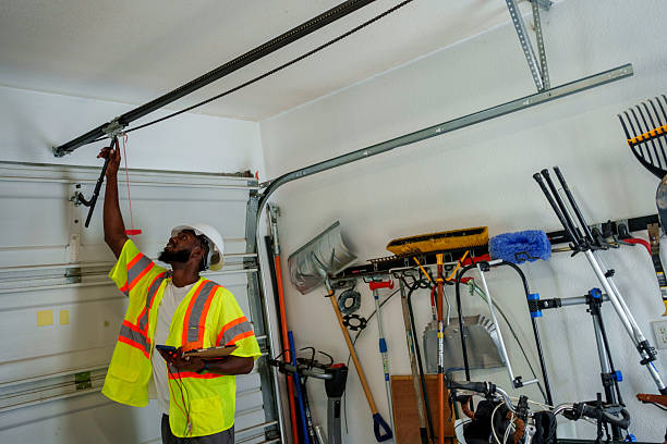 Professional Garage Door Panel Replacement technician working in Melrose Park, NY